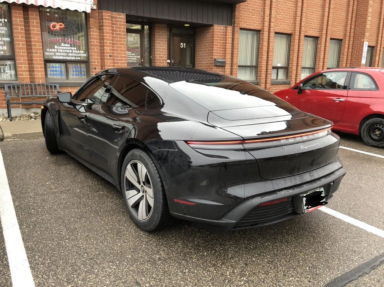 Porsche Taycan with dark window tint